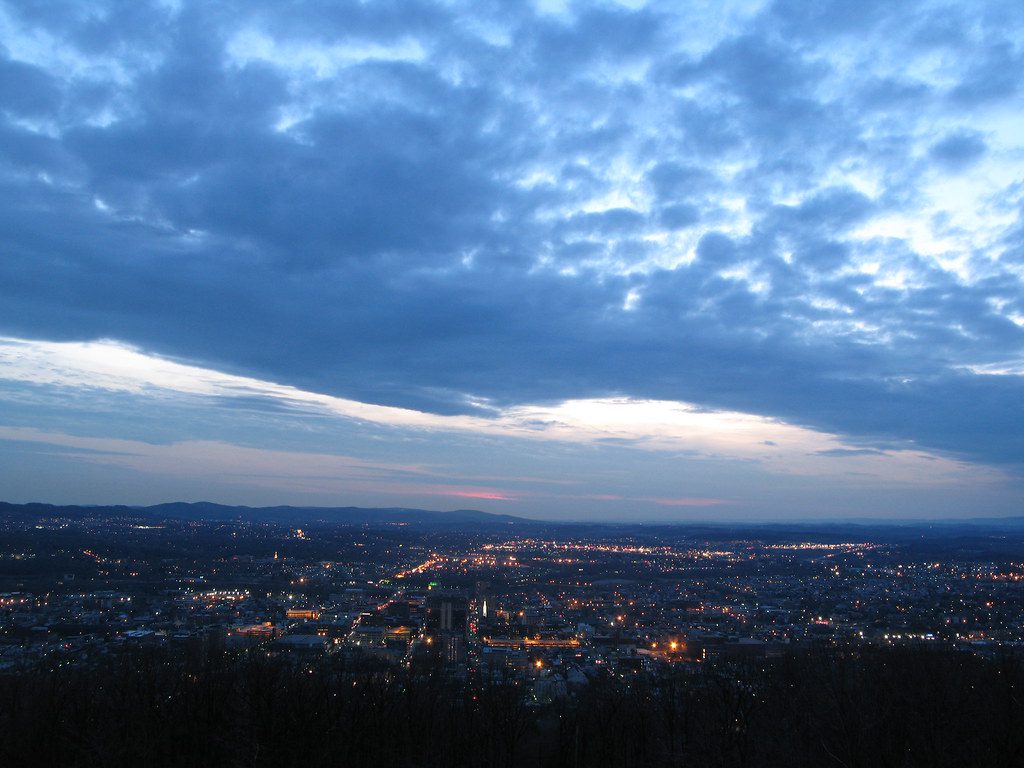 Reading, Pennsylvania city lights at twilight seen from Mount Penn, representing in-home newborn circumcision in Reading