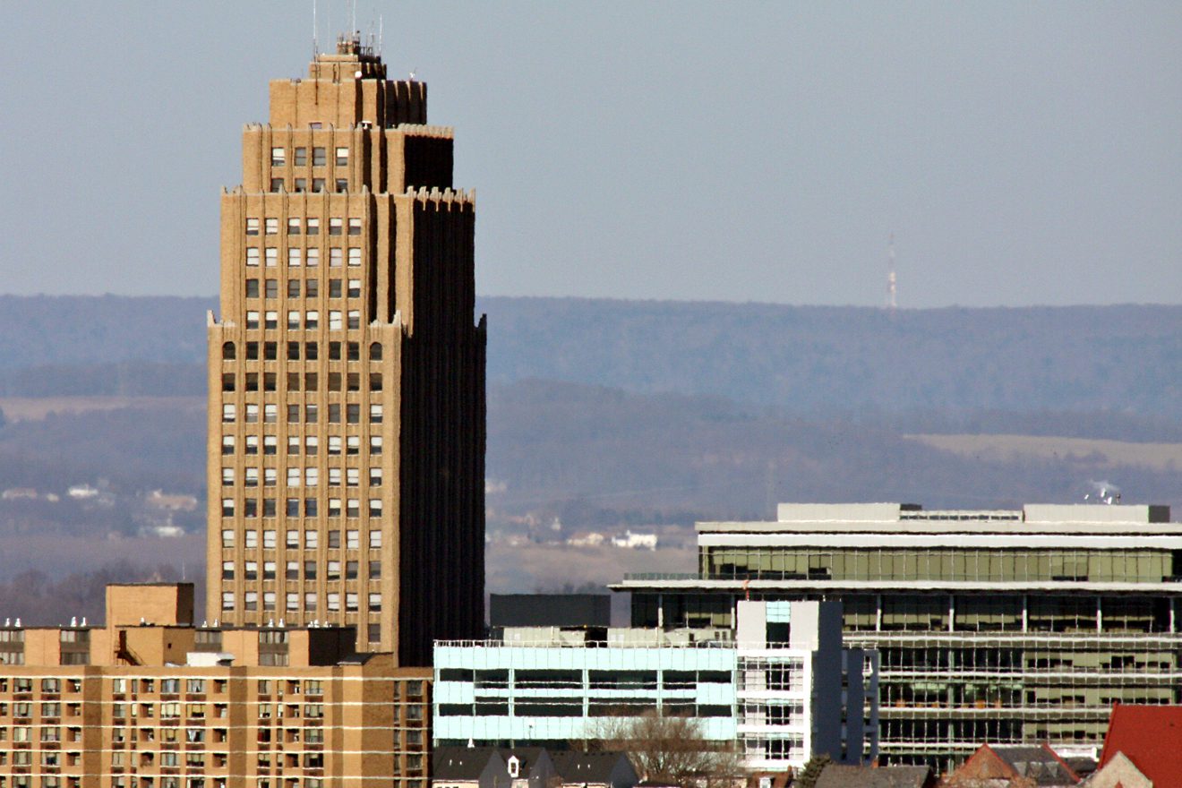 Allentown skyline with the PPL Building tower in warm afternoon light, representing in-home newborn circumcision in Allentown